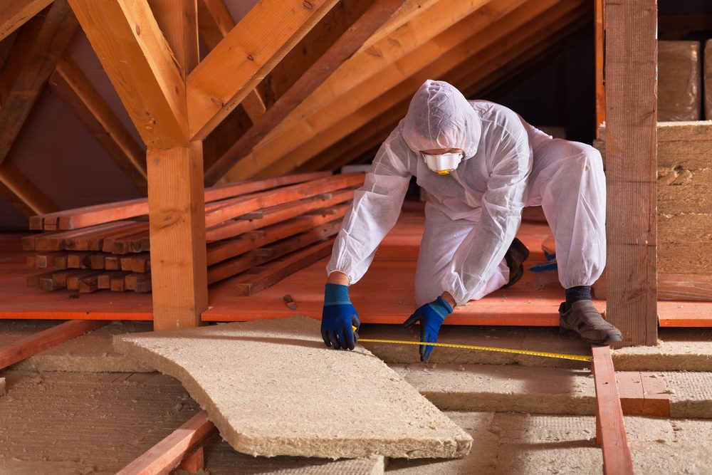 Using tape measure on loft floor boards