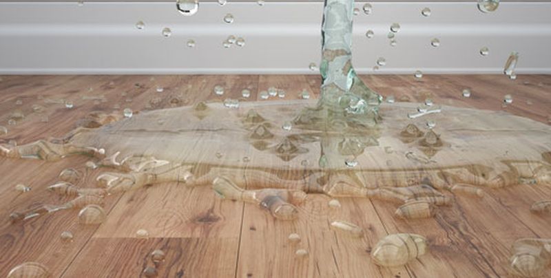 water-on-the-wooden-floor|removing-boards|refinishing-the-floor