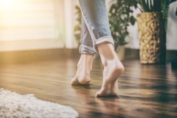 Women walking on Wood Flooring - Best eco-friendly flooring to reduce household bills|Insulation under floor